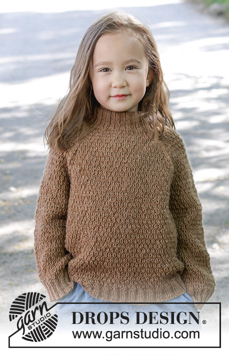 Chocolate Puff / DROPS Children 47-11 - Dětský raglánový pulovr s plastickým vzorem pletený shora dolů z příze DROPS Lima nebo DROPS Daisy. Velikost 2 až 12 let.