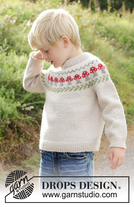 Mushroom Season Sweater / DROPS Children 47-13 - Gebreide trui voor kinderen in DROPS Karisma. Het werk wordt van boven naar beneden gebreid met dubbele halsrand, ronde pas en veelkleurig paddenstoelenpatroon. Maten 2 – 14 jaar.