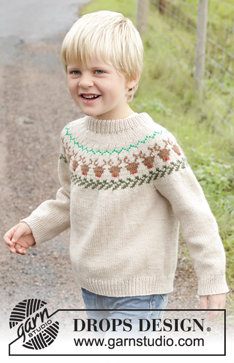 Reindeer Dance Sweater / DROPS Children 47-18 - Kötött pulóver gyerekeknek DROPS Daisy fonalból. A darabot fentről lefelé irányban készítjük, dupla nyakkal, kerek vállrésszel és színes rénszarvas mintával. 2 - 14 éveseknek való méretekben