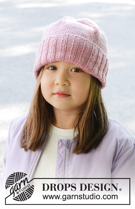 Candy Kiss Hat / DROPS Children 47-27 - Dziecięca czapka na drutach, z włóczki DROPS Merino Extra Fine. Wykonana dżersejem, z wyłożeniem na dole. Od 2 do 12 lat.