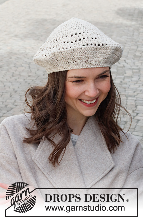 Book Fair / DROPS 225-22 - Crocheted beret in DROPS Soft Tweed. The piece is worked top down with lace pattern.