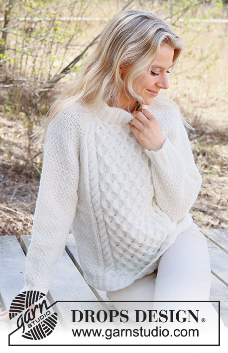 Cream Wafer / DROPS 236-15 - Knitted jumper in DROPS Air. The piece is worked top down with raglan, double neck, cables and moss stitch. Sizes S - XXXL.