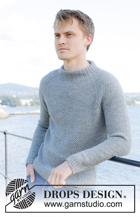 Winter Weekend / DROPS 246-11 - Knitted sweater for men in DROPS Nord. The piece is worked top down with raglan, moss stitch and double neck. Sizes S - XXXL.