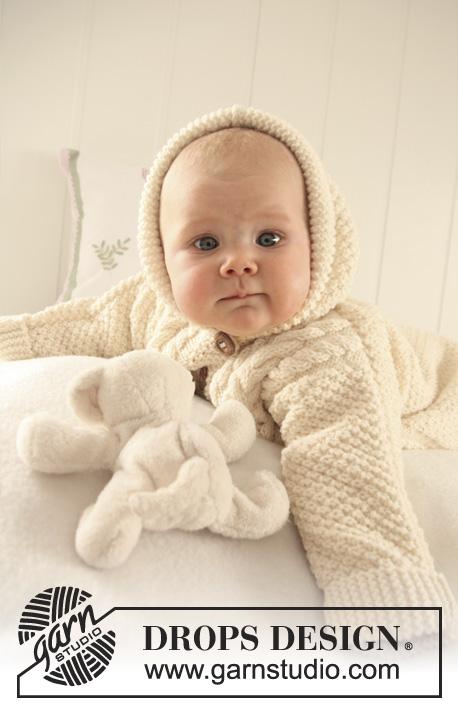 Snuggly Bunny / DROPS Baby 19-10 - Ninho tricotado em ponto de arroz, ponto texturado e tranças em DROPS Merino Extra Fine
